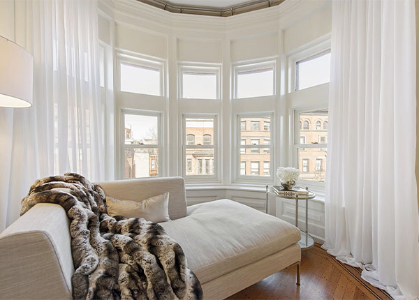 Остекление эркерными окнами квартиры в Долгопрудном