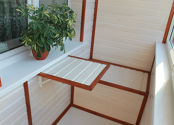 Отделка и утепление балкона деревянной вагонкой в Долгопрудном